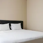 Spacious And Homey 2Br At Ciputra International Apartment By Travelio