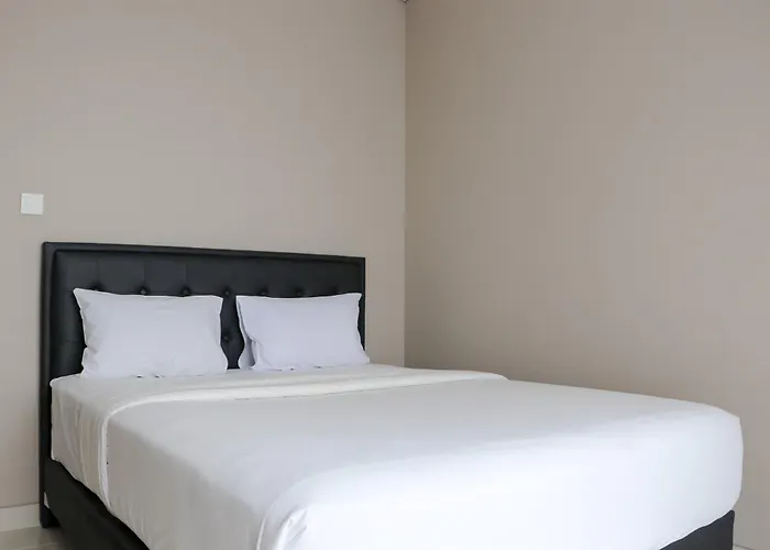 Spacious And Homey 2Br At Ciputra International Apartment By Travelio